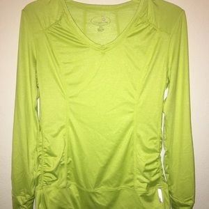 Women’s tangerine active wear long sleeve shirt.